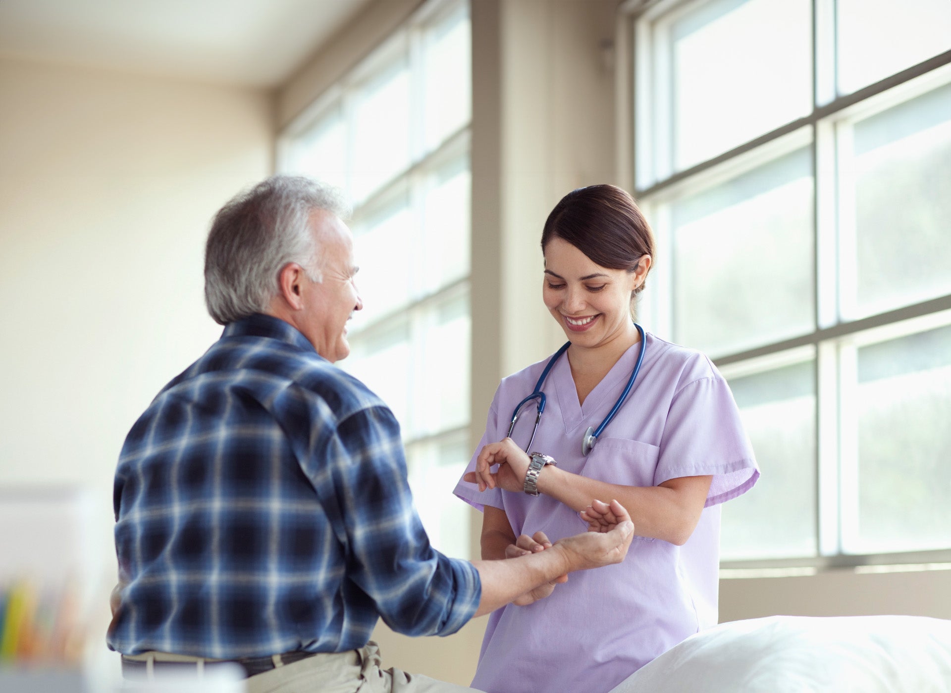 doctor with patient at hospital