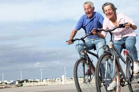 old people riding bicycles